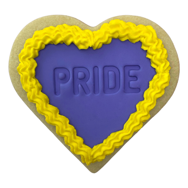 Sweet Mickie Pride Cookies with royal icing frills in rainbow colours