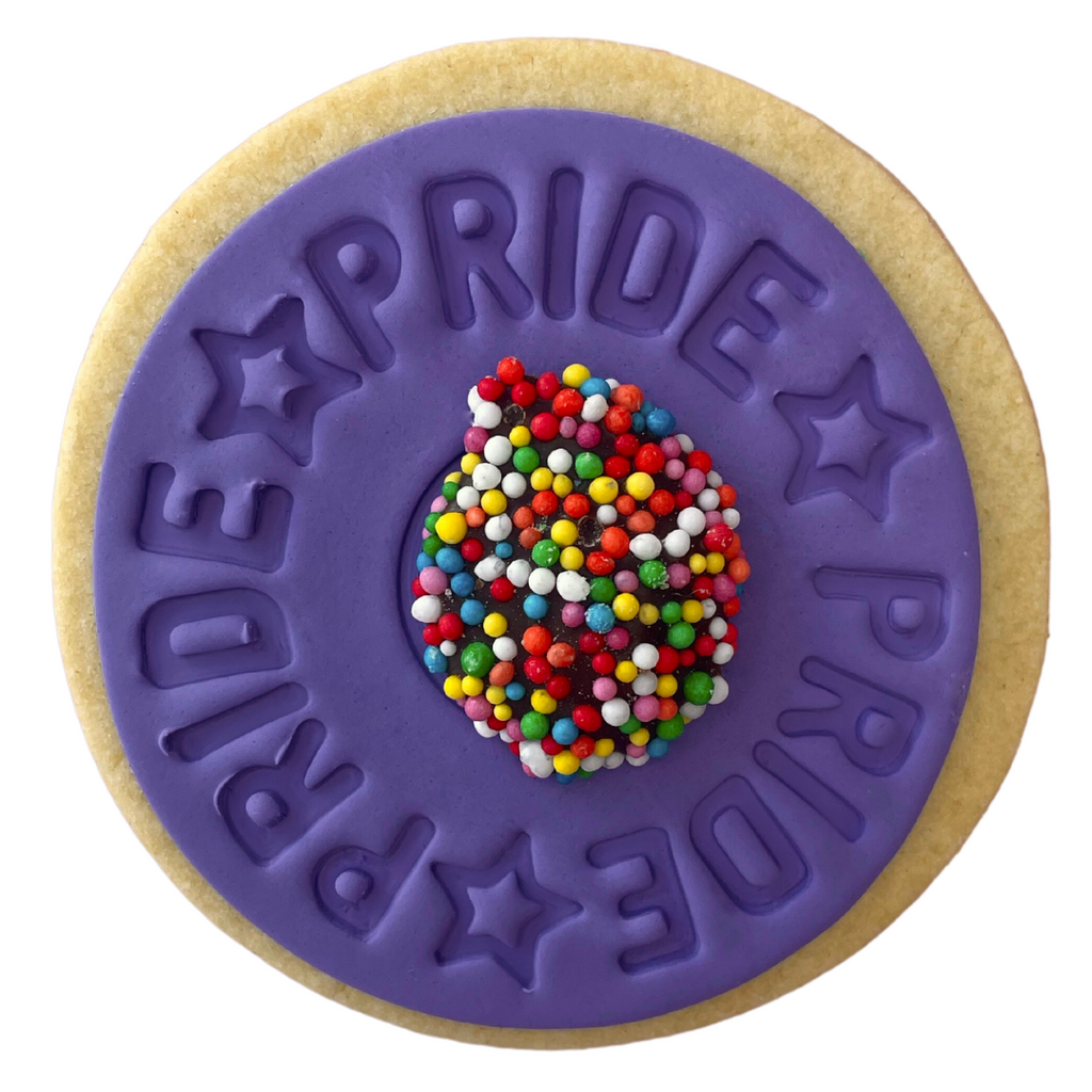 Sweet Mickie Pride Cookie with pride quote and star detail on a chocolate freckle and vanilla shortbread cookie