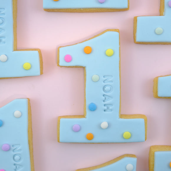 Custom birthday number cookies with names for first birthdays, milestone celebrations and party favours in Australia