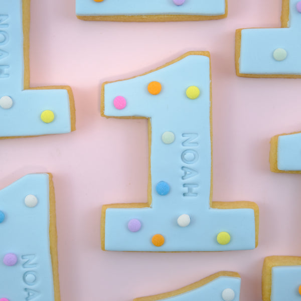 Custom birthday number cookies with names for first birthdays, milestone celebrations and party favours in Australia