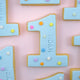 Custom birthday number cookies with names for first birthdays, milestone celebrations and party favours in Australia