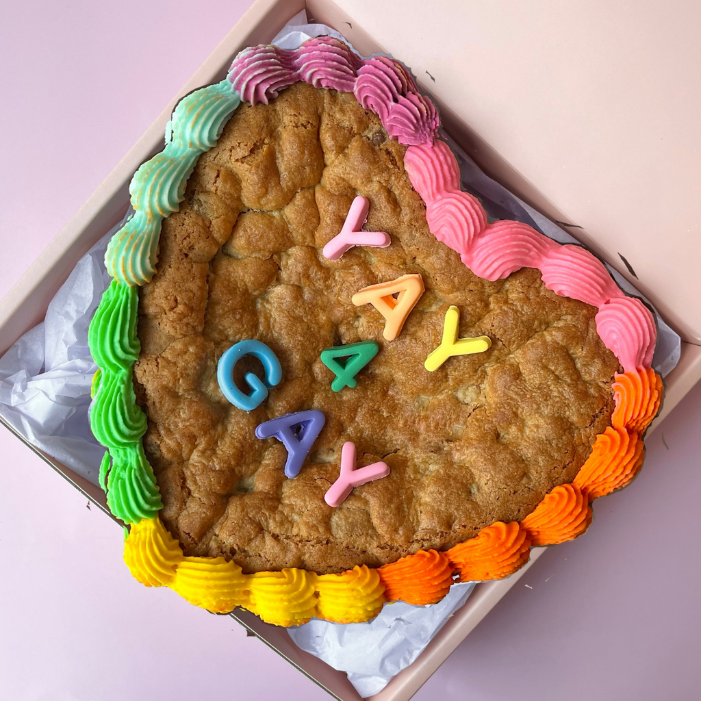 Sweet Mickie Pride Cookie Cake with Yay 4 Gay quote and rainbow frill icing - White chocolate blondie cookie cake
