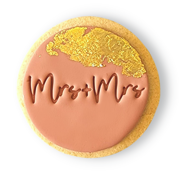 Sweet Mickie wedding cookies with custom titles and gold leaf