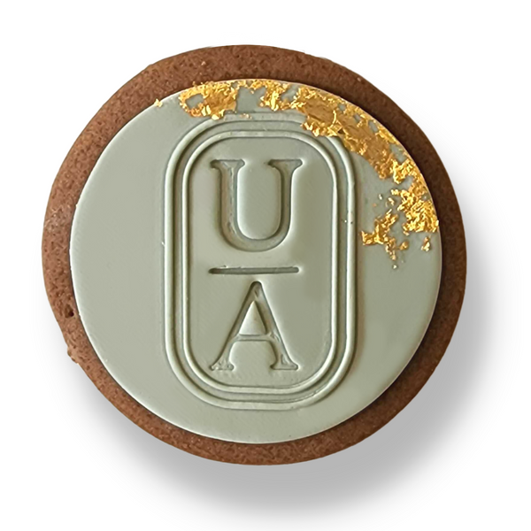 Sweet Mickie wedding cookies with custom monogram initials with gold leaf