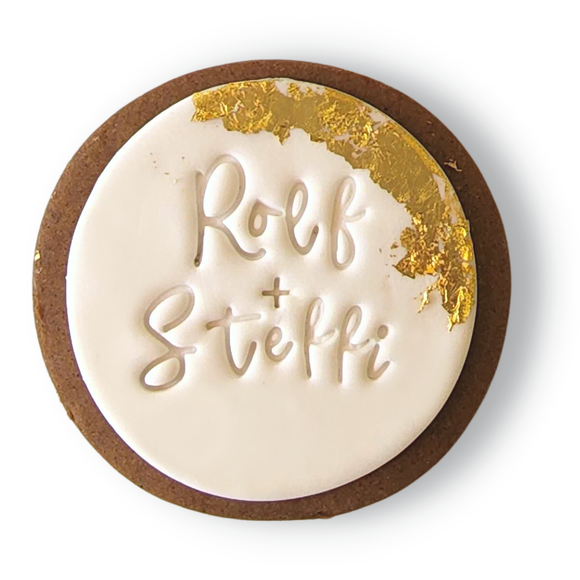 Sweet Mickie wedding cookies with customs names and gold leaf